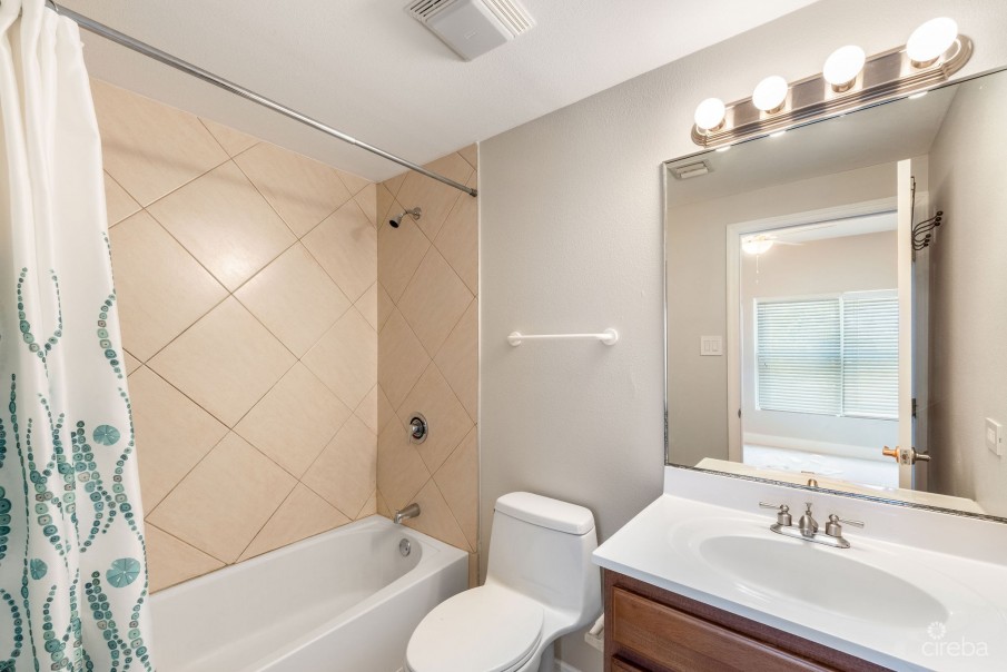 UPGRADED COASTAL ESCAPE CANAL FRONT TOWNHOUSE - Image 19