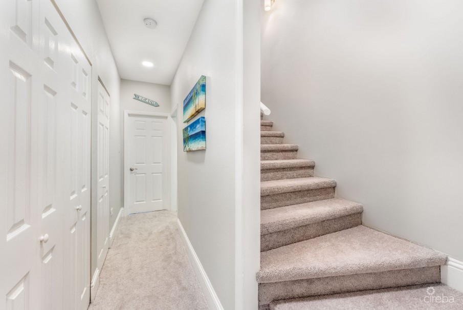 UPGRADED COASTAL ESCAPE CANAL FRONT TOWNHOUSE - Image 9