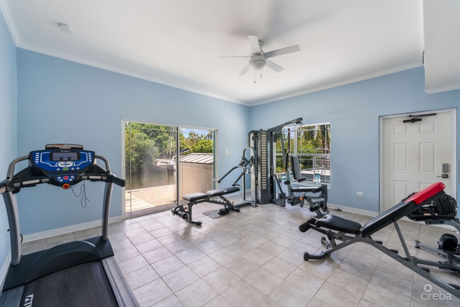 UPGRADED COASTAL ESCAPE CANAL FRONT TOWNHOUSE - Image 23