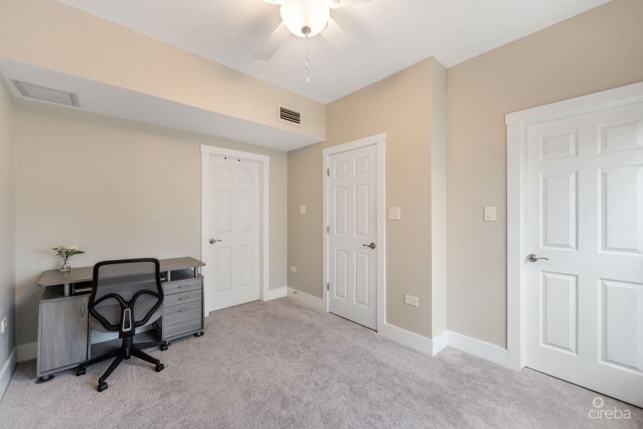 UPGRADED COASTAL ESCAPE CANAL FRONT TOWNHOUSE - Image 17