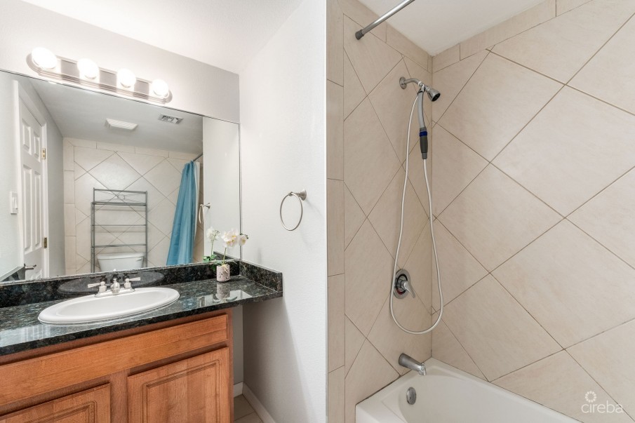 UPGRADED COASTAL ESCAPE CANAL FRONT TOWNHOUSE - Image 16